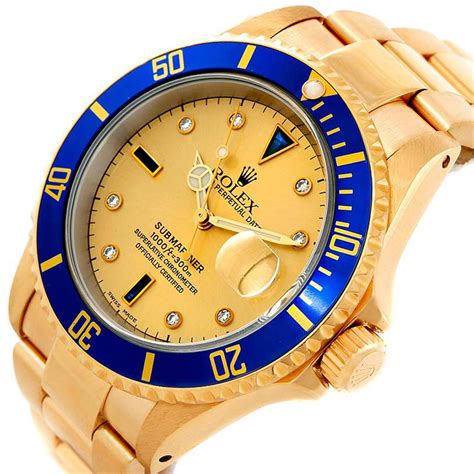 rolex submariner 16618 yellow gold.